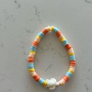 Hand made clay bead bracelet with a turtle charm